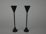 paire de bougeoirs noirs et dorés