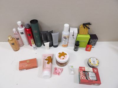 many different types of beauty products laid out on a table