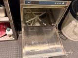 a small oven that is open on the floor