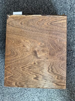 an image of a piece of wood that is laying on the floor