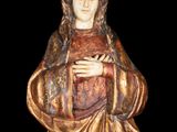 a statue of a woman with a crown on her head