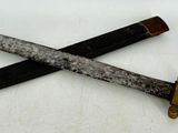 two knives that are laying on top of each other