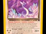 the pokemon card has a picture of a purple dragon on it ' s back
