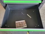 a newspaper in a drawer with a newspaper inside of it