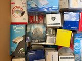 a cardboard box filled with many different types of electronic devices
