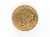 an image of a gold coin on a white surface