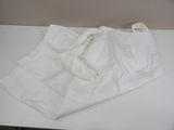 a white bag sitting on top of a white counter