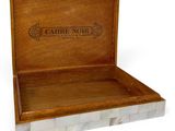 an image of a wooden box with a logo on it