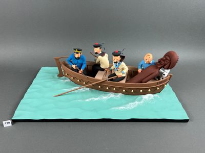 figurines représentant des personnes dans un bateau sur une surface bleue