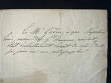 a close up of a piece of paper with writing on it