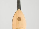 a small wooden instrument hanging from the ceiling