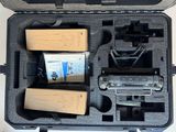 a black case with tools inside of it on a table
