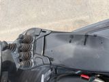 a close up of a motorcycle with a seat on it ' s back