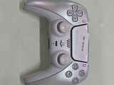 a close up of a video game controller on a wall