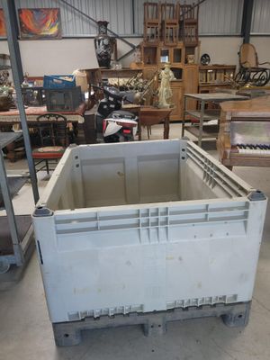 a large white box sitting in the middle of a room