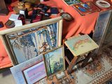 a table that has a lot of art on it