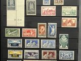 a picture of a collection of stamps on display in a glass case