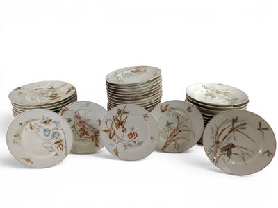 a lot of plates that are sitting on a table