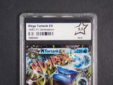 a close up of a pokemon trading card on a table