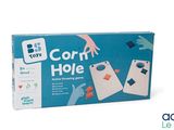 jeu de « corn hole » dans une boîte, sur fond blanc