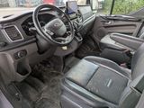 a view of the inside of a vehicle from the driver ' s seat
