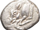 a close up of a silver coin with a horse on it