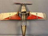 a small model of a plane on display on a table