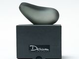 a black box with a gray object on top of it