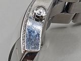 a close up of a watch that is on a table