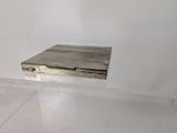 a small piece of wood in the middle of the floor