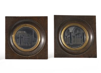 pair of bronze and wood plaques depicting a church and a church