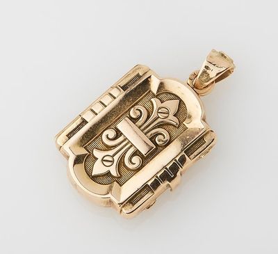 an 18k gold locke pendant with a cross on it