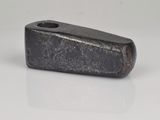 a small piece of metal that is sitting on a table