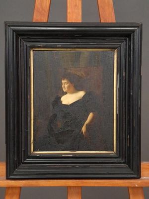 painting of a woman in a black dress on a wooden easel