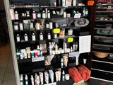 many different types of cosmetics products on display in a store
