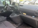 a picture of a car that is parked in the parking lot