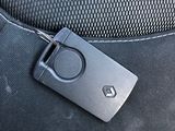 a car key in the back seat of a car