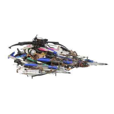 a pile of assorted items on a white surface