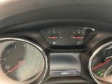 a close up of a car dashboard with various gauges