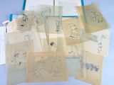 a lot of drawings on the pages of a book
