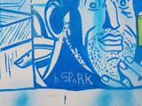 painting of a man with a beard and mustache on a wall