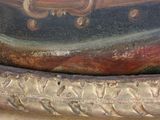 a close up of a painting of a man with a guitar