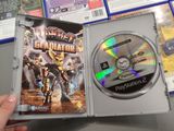 a person holding a dvd case with a game on it