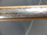 a close up of a baseball bat with a metal handle