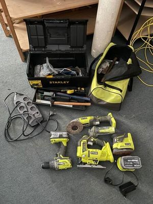 a lot of tools that are laying out on the floor