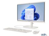 a computer monitor with a keyboard and mouse next to it