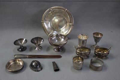 a lot of silver items that are on the table