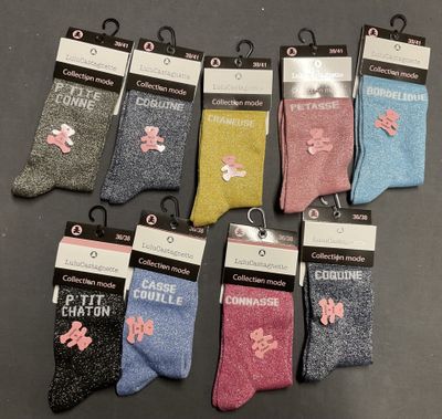 six pairs of children ' s socks with pink bows on them