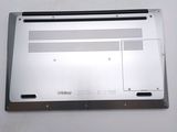 a laptop that is sitting on a white table