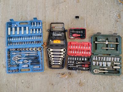 a lot of tools that are laying out on the floor